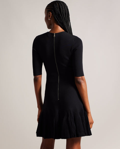JOSAFEE-Dresses-When knitwear and glamour collide, you get JOSAFEE. This perfectly tailored mini dress boasts a figure hugging silhouette with a pleated hemline that ensures you'll look and feel fabulous in any setting, from a lunch date to a weekend exploring the city. Knitted mini dress Fit and flare silhouette Pleated hem Crew neck Half length sleeves Exposed zip fastening Ribbed waistband Jara is 5'10.5" / 1.79m and wears Dark Red in a Ted size 1 Feminine detailsA flirty pleated hem adds an interesting